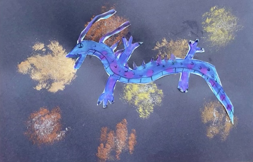 student art of blue and purple dragon breathing golden fire