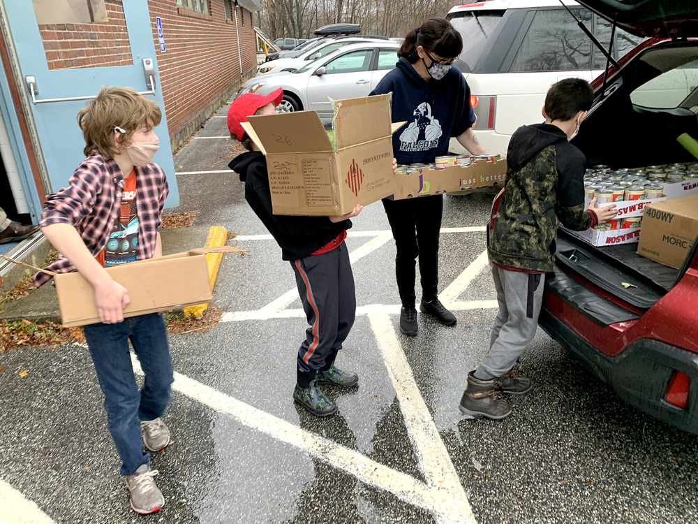 Fisher Mitchell School students deliver canned food donations to the Bath Area Food Bank