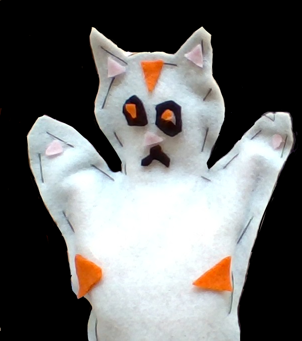 white felt cat puppet with yellow, pink and black marks