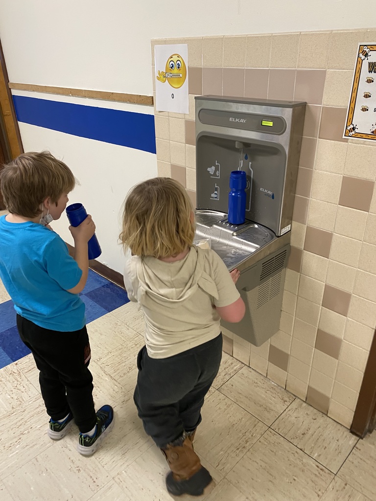 students using the new bottle filling stations