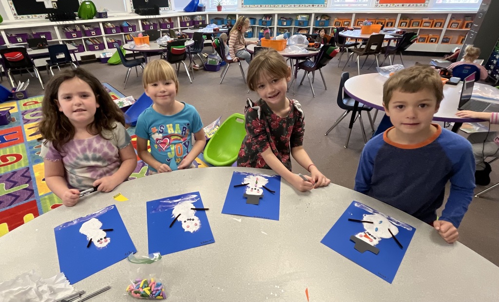proud 1st graders with snowmen