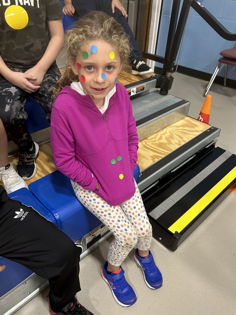 students wearing dots