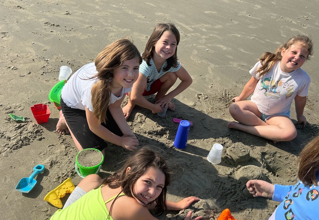 students making sandcastles